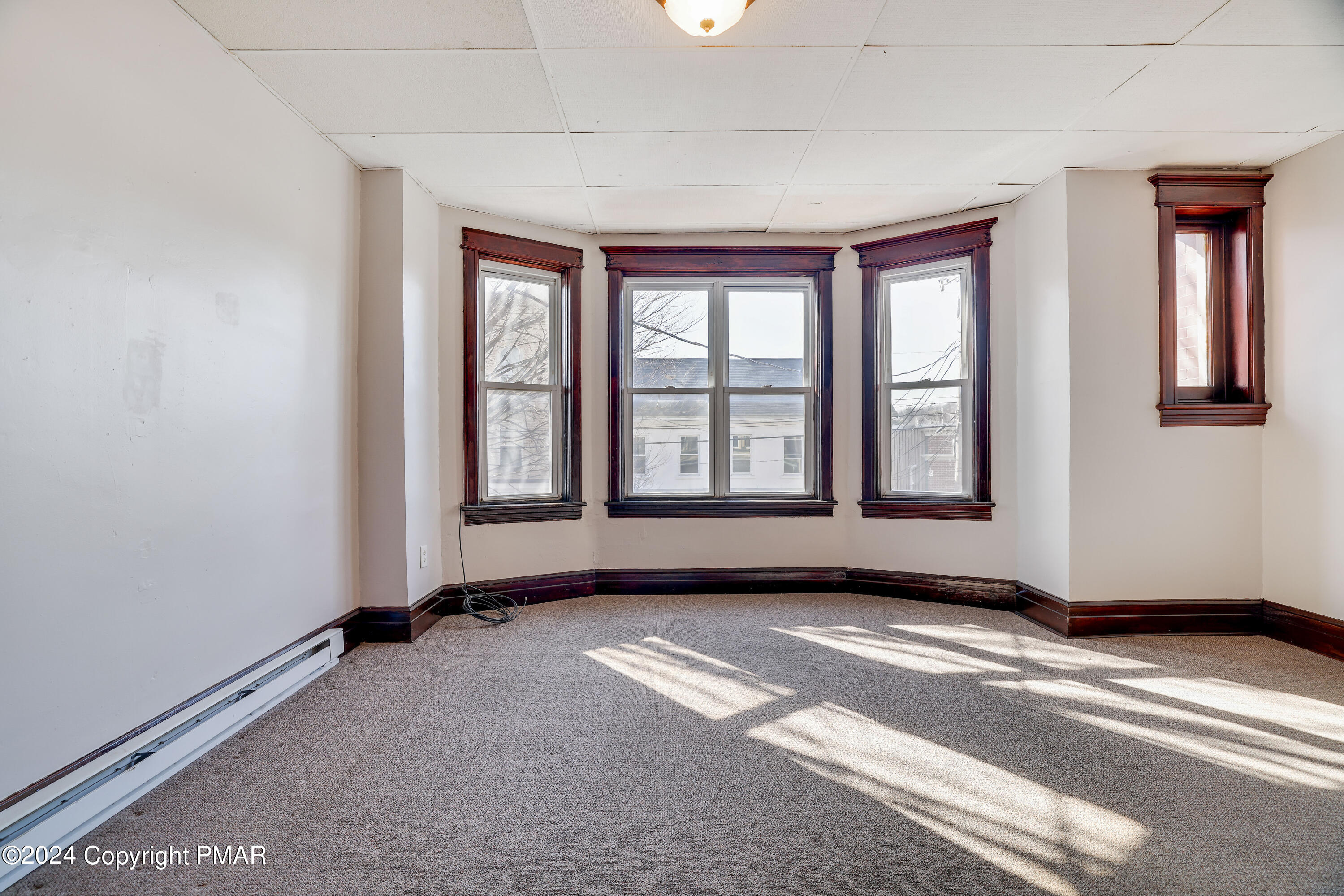 139 South Main Street Nazareth, PA 18064 - Photo 4 of 24 a view of an empty room with a window