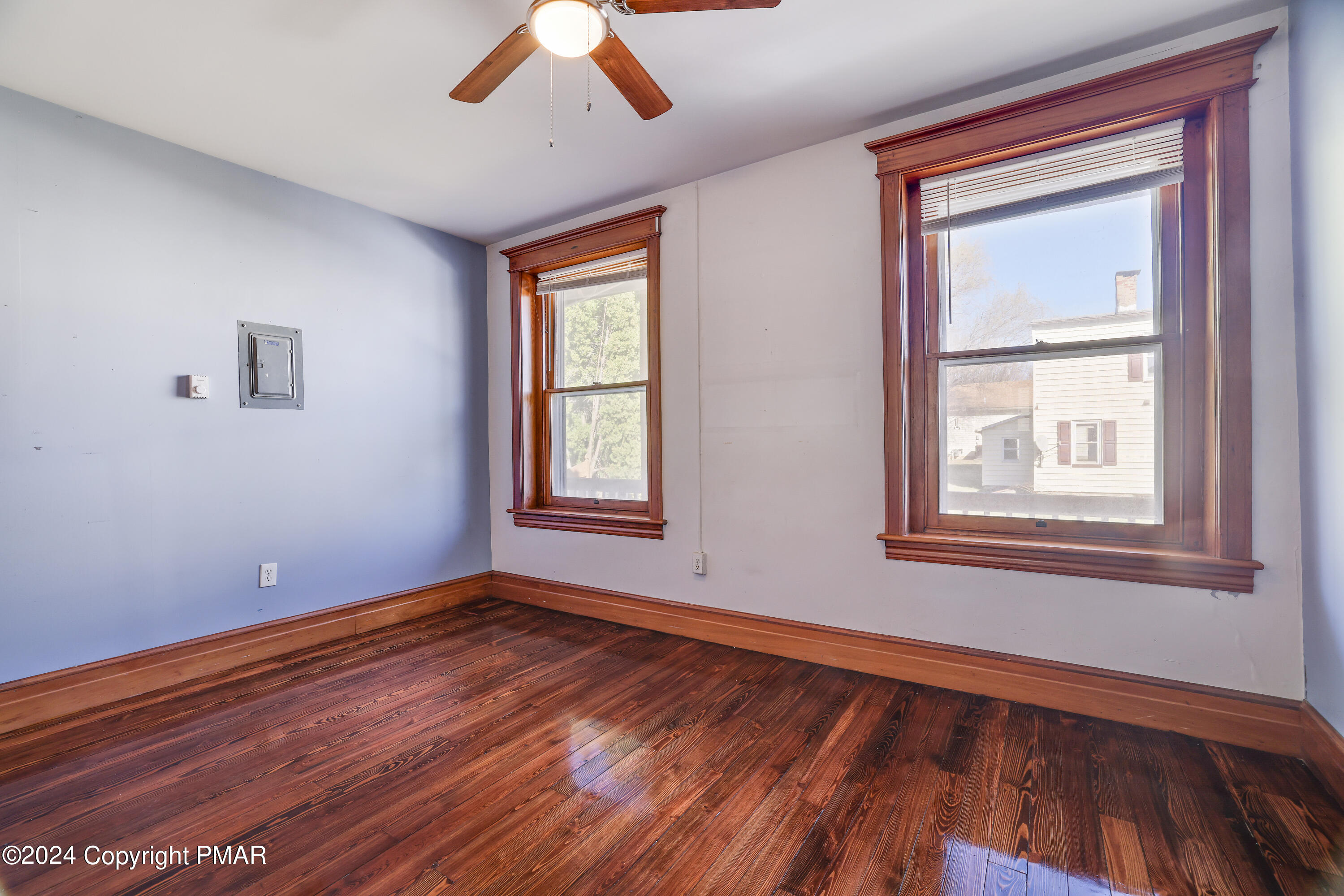 139 South Main Street Nazareth, PA 18064 - Photo 8 of 24 a view of an empty room with wooden floor and a window