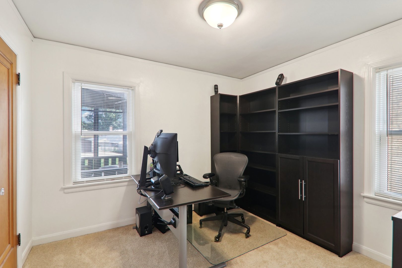 5853 North Central Avenue Chicago, IL 60646 - Photo 13 of 31 a view of a workspace with furniture and a window