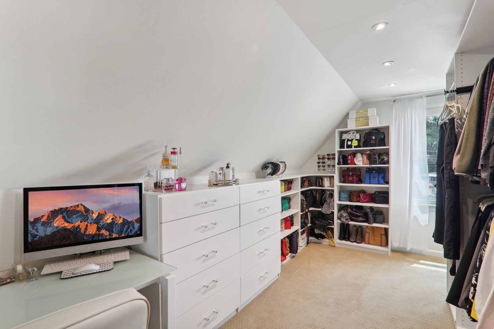 5853 North Central Avenue Chicago, IL 60646 - Photo 17 of 31 a view of a livingroom with furniture and a flat screen tv