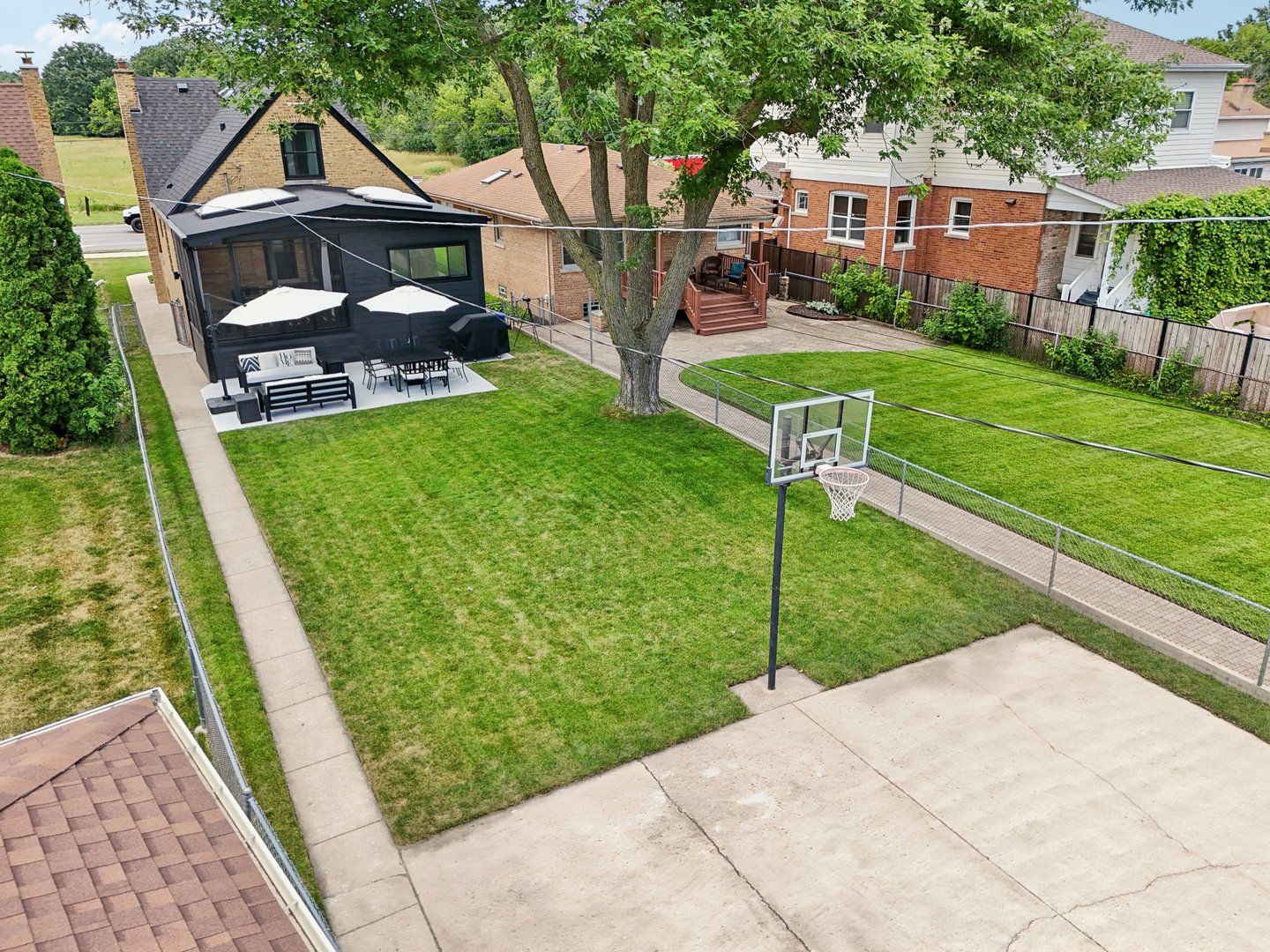 5853 North Central Avenue Chicago, IL 60646 - Photo 29 of 31 a view of a house with backyard and porch