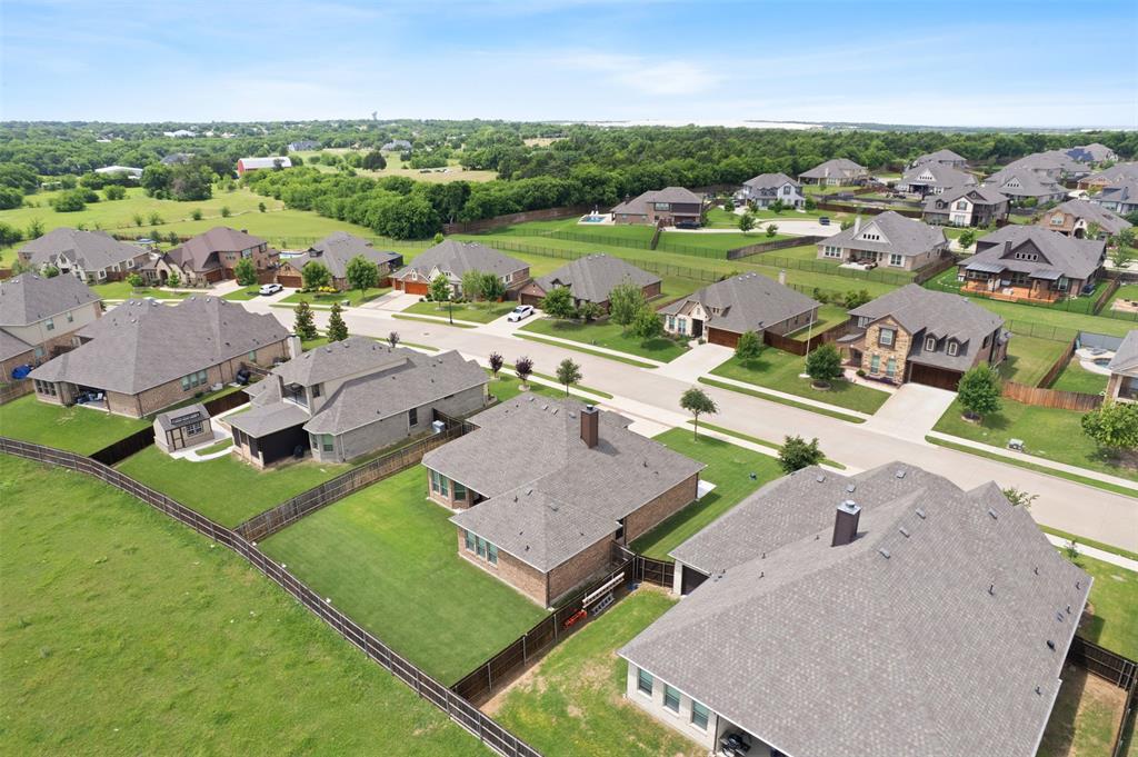 2618 Byrd Ranch Road Midlothian, TX 76065 - Photo 34 of 38 an aerial view of a house with a garden and lake view