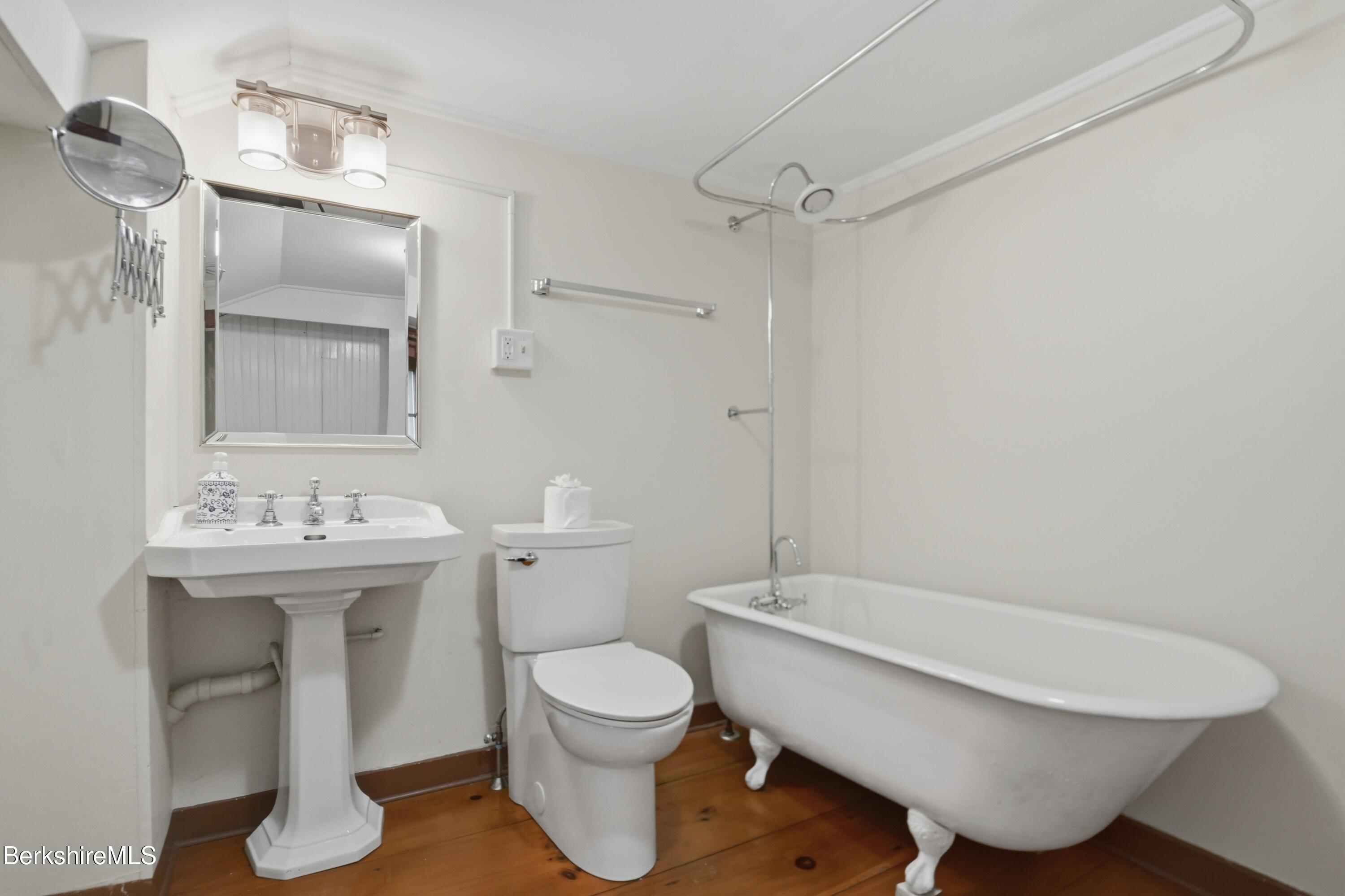 4 Stockbridge Road West Stockbridge, MA 01266 - Photo 68 of 94 a bathroom with a toilet sink and mirror