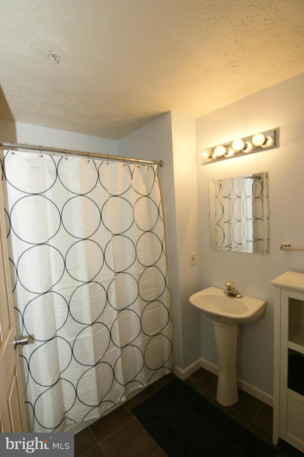 5024 Finsbury Road Baltimore, MD 21237 - Photo 23 of 25 Lower Level Full Bath