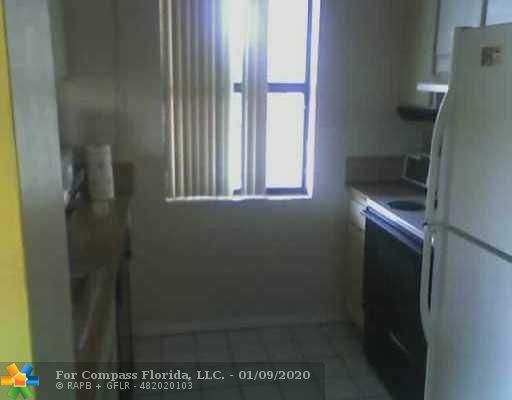 3252 Foxcroft Road, Unit 301 Miramar, FL 33025 - Photo 2 of 6 Kitchen