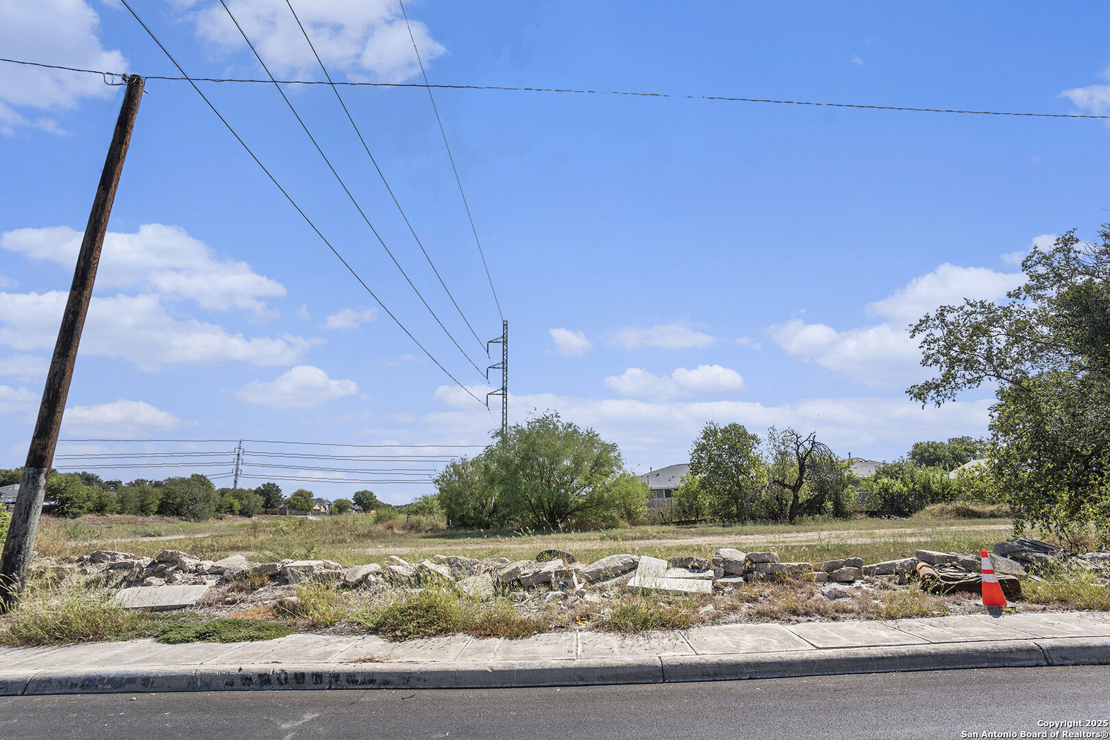 302 Southwest 41st Street San Antonio, TX 78237 - Photo 6 of 19 a view of a road with a building in the background