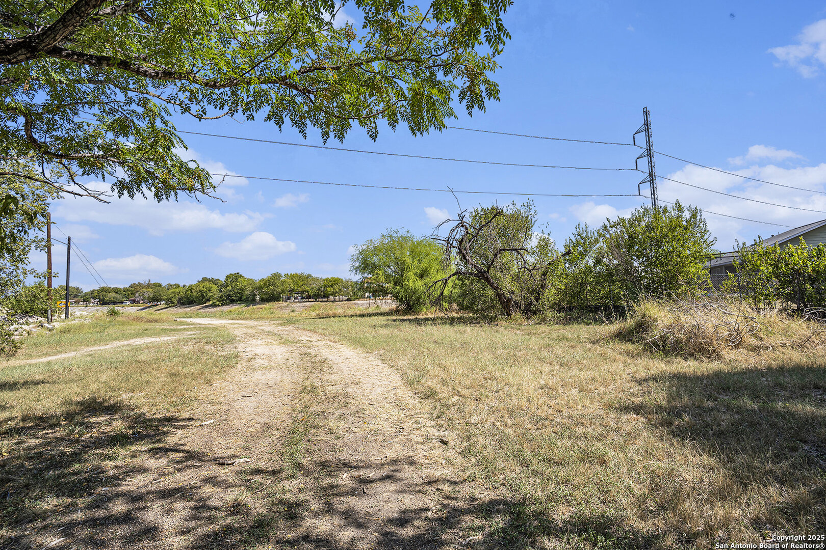 302 Southwest 41st Street San Antonio, TX 78237 - Photo 10 of 19 a view of a lake with outdoor space