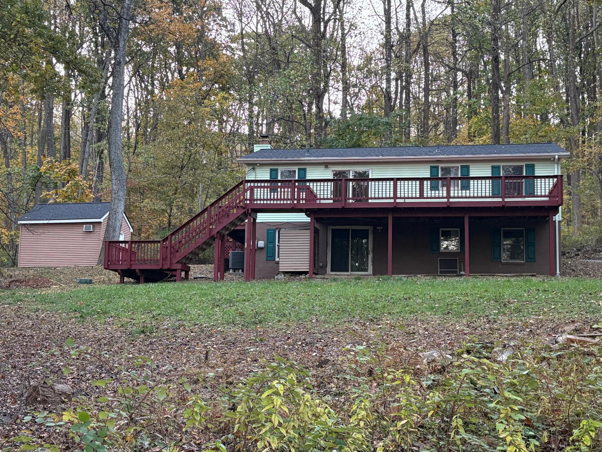 28 Henry Way Linden, VA 22642 - Photo 2 of 39 a house that has a tree in front of it