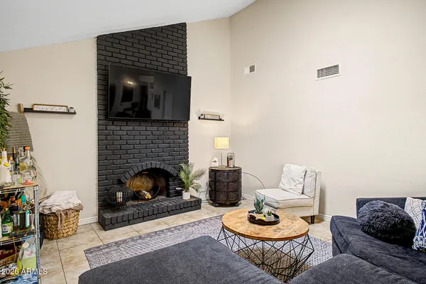 a living room with furniture and a couch
