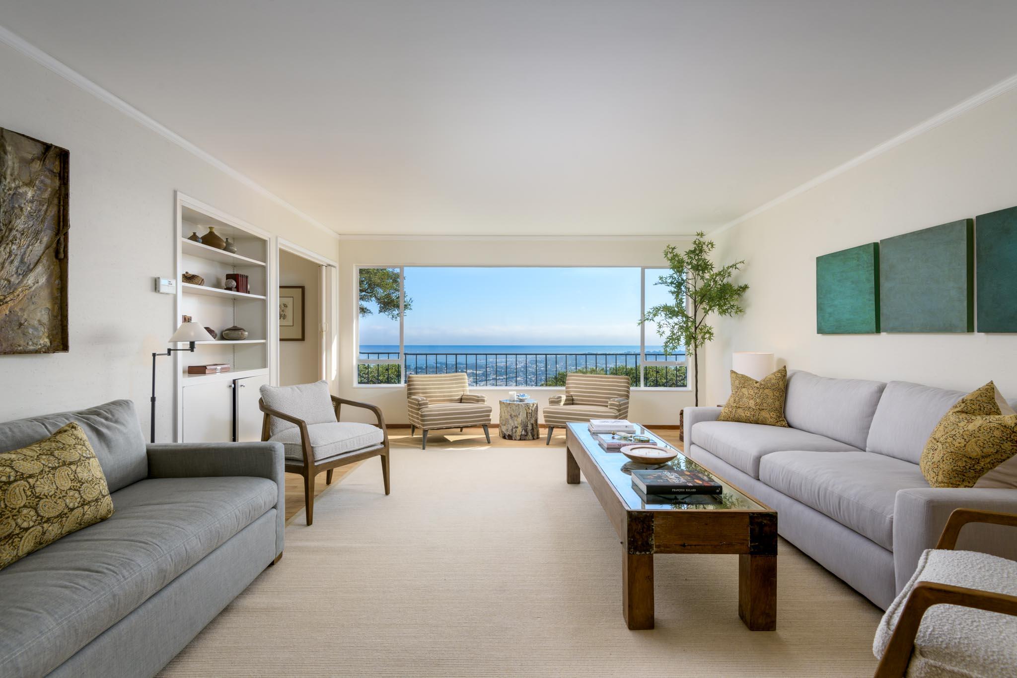 929 Arbolado Road Santa Barbara, CA 93103 - Photo 12 of 29 a living room with furniture and a large window