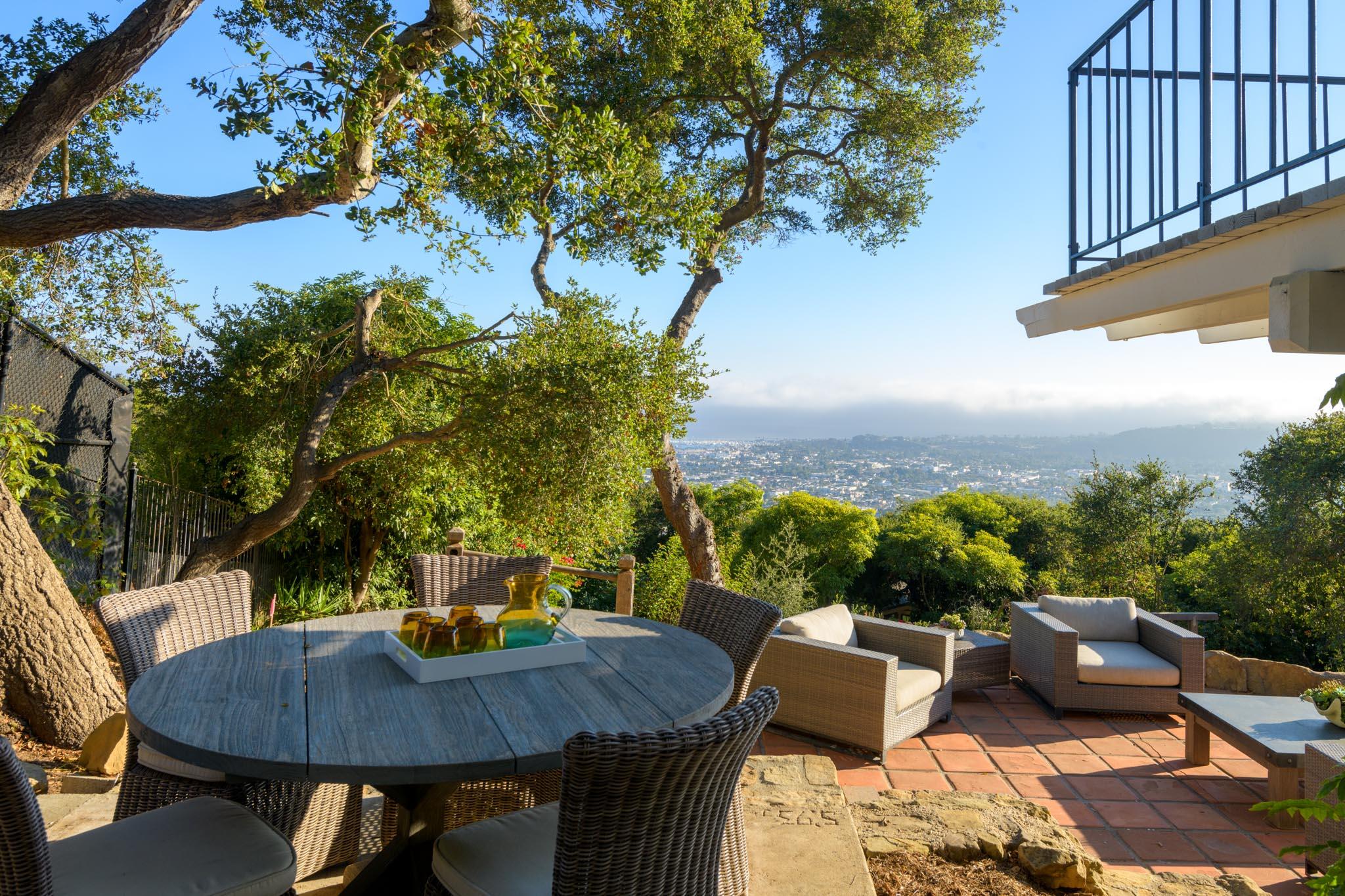 929 Arbolado Road Santa Barbara, CA 93103 - Photo 22 of 29 a view of backyard of house with seating space
