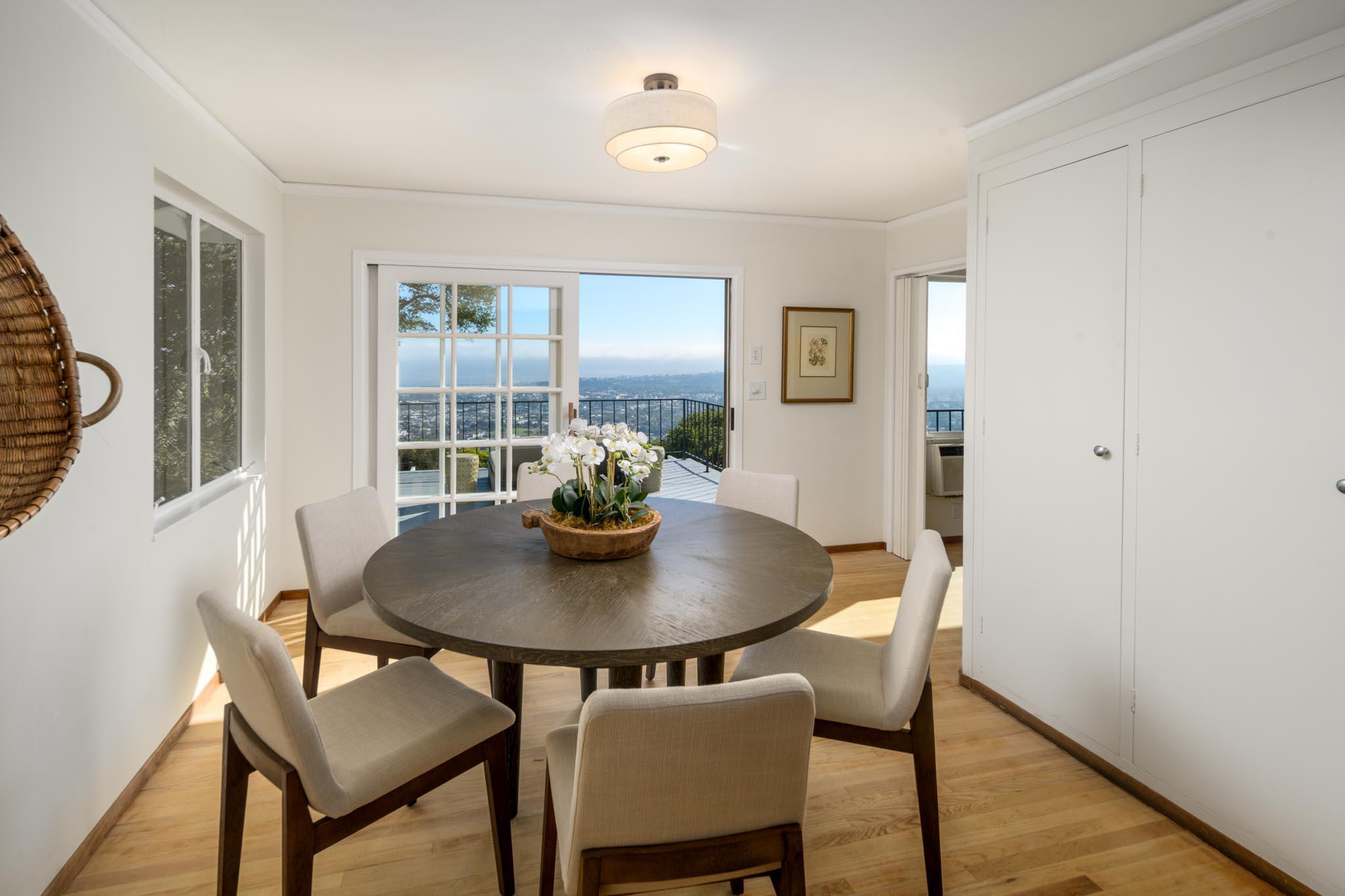 929 Arbolado Road Santa Barbara, CA 93103 - Photo 8 of 29 a view of a dining room with furniture and wooden floor