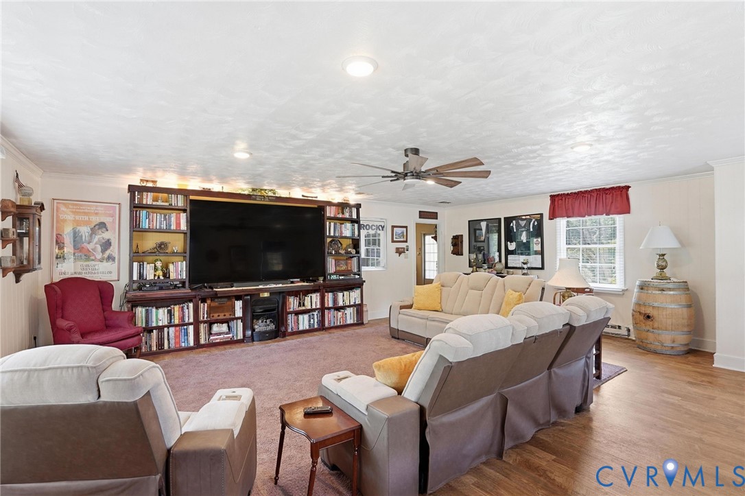 11016 Pridesville Road Amelia Court House, VA 23002 - Photo 11 of 54 Expansive living area featuring a large built-in m