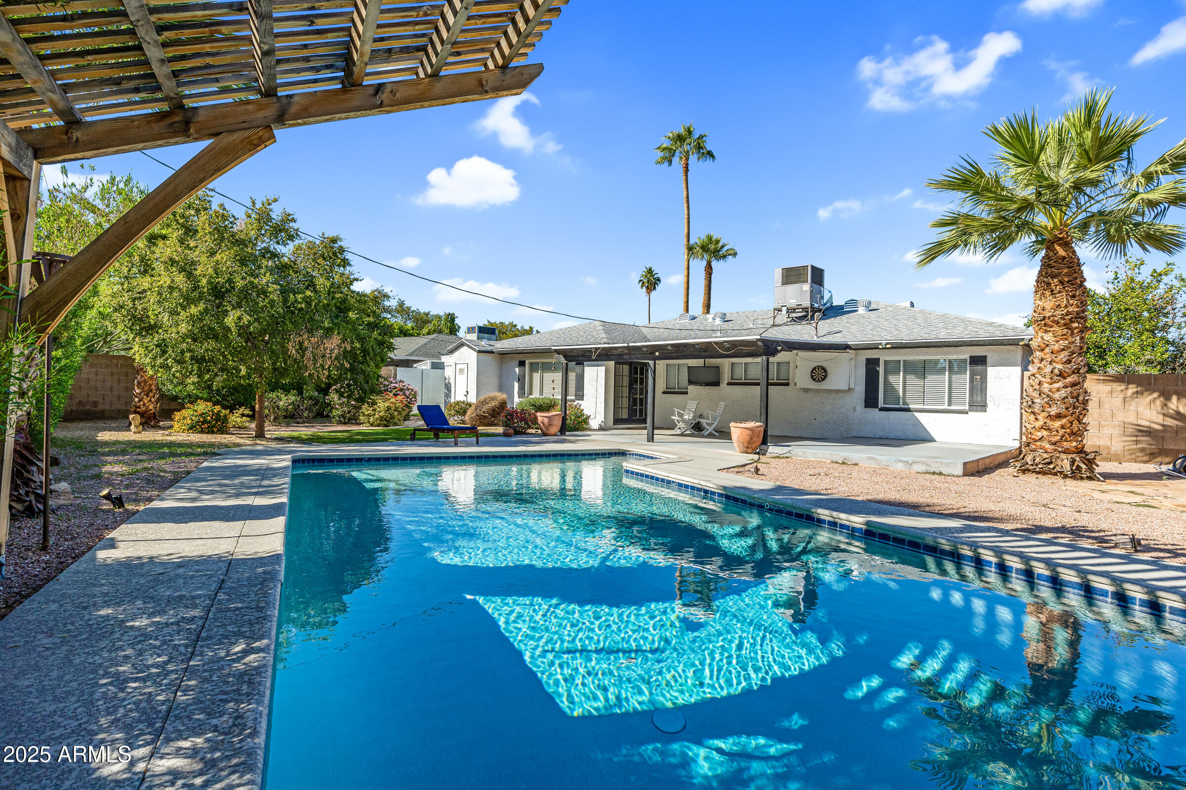 6829 East Almeria Road Scottsdale, AZ 85257 - Photo 2 of 35 a view of a house with swimming pool