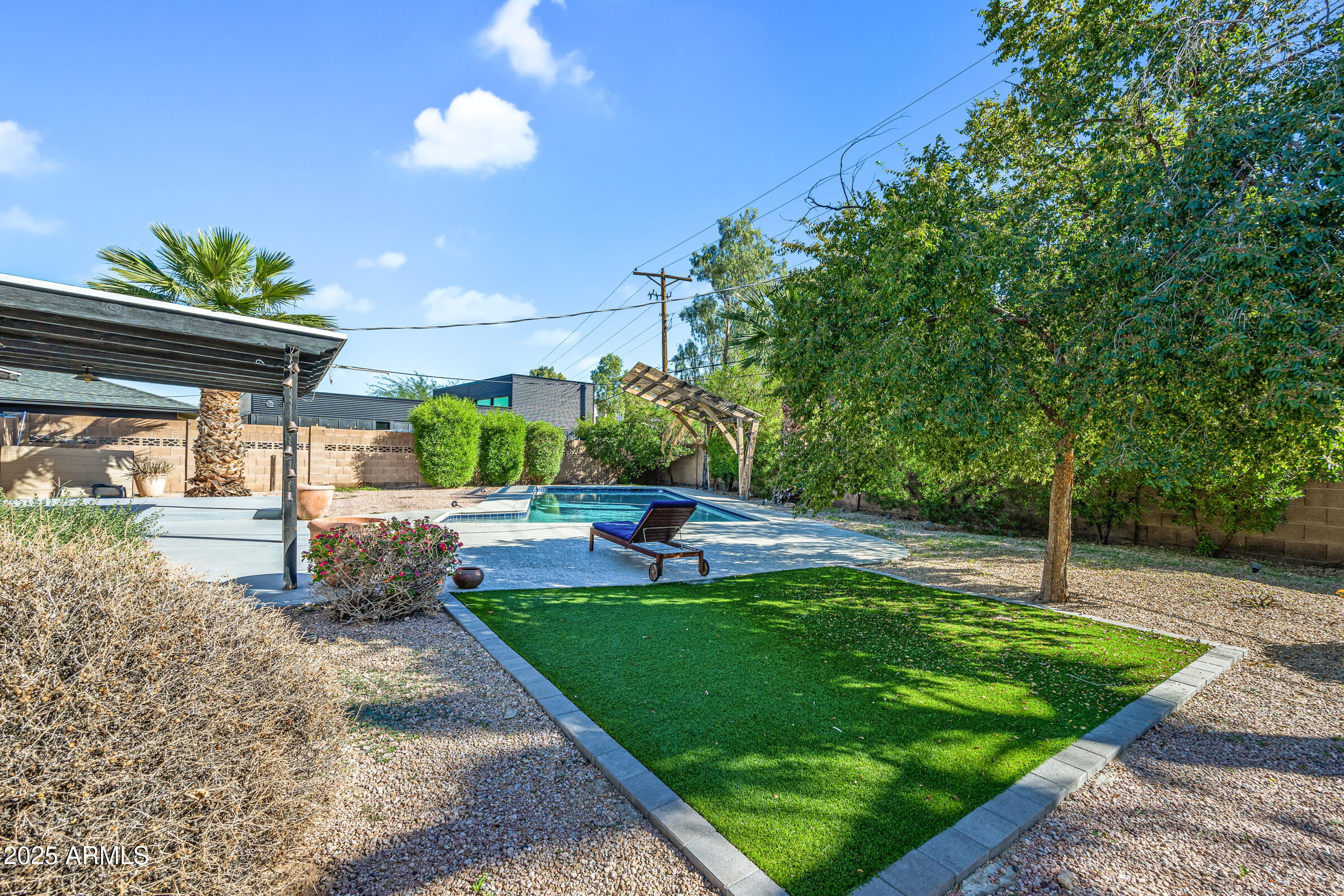 6829 East Almeria Road Scottsdale, AZ 85257 - Photo 30 of 35 a view of a backyard with a garden