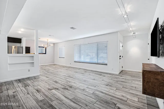 a view of a kitchen from the hallway