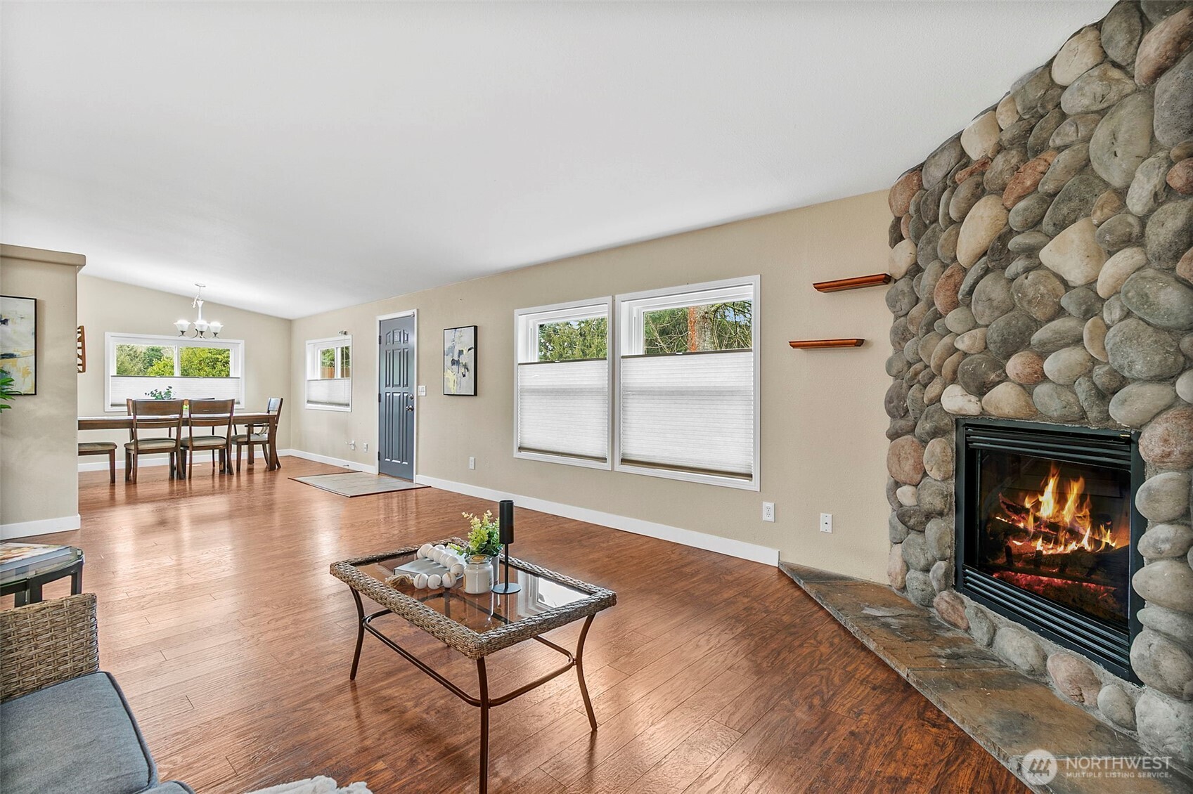 4416 South 315th Street Auburn, WA 98001 - Photo 13 of 37 a living room with furniture and a fireplace