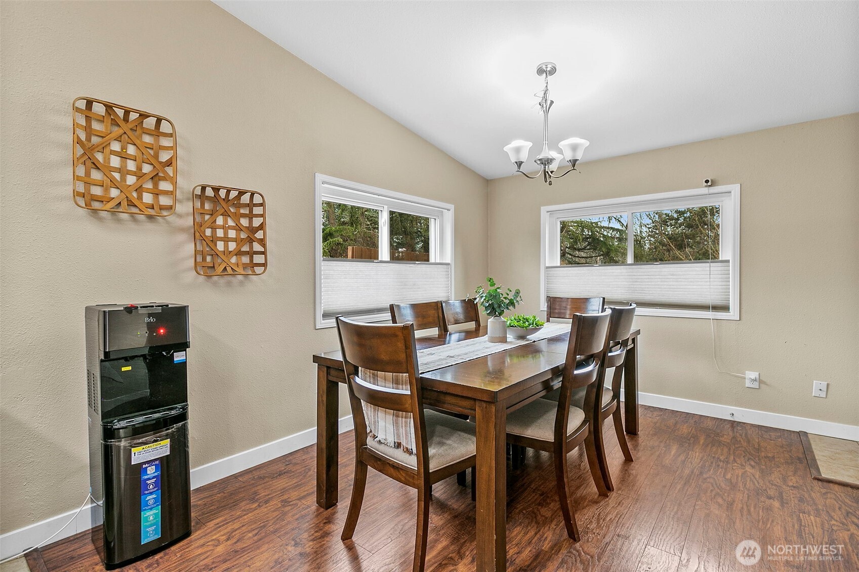 4416 South 315th Street Auburn, WA 98001 - Photo 18 of 37 a view of a dining room with furniture window and wooden floor