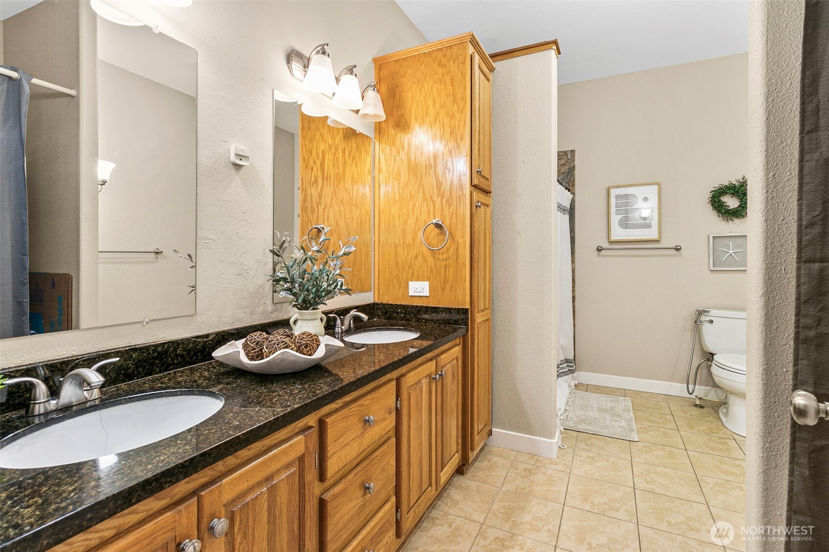4416 South 315th Street Auburn, WA 98001 - Photo 31 of 37 a bathroom with a granite countertop sink and a mirror