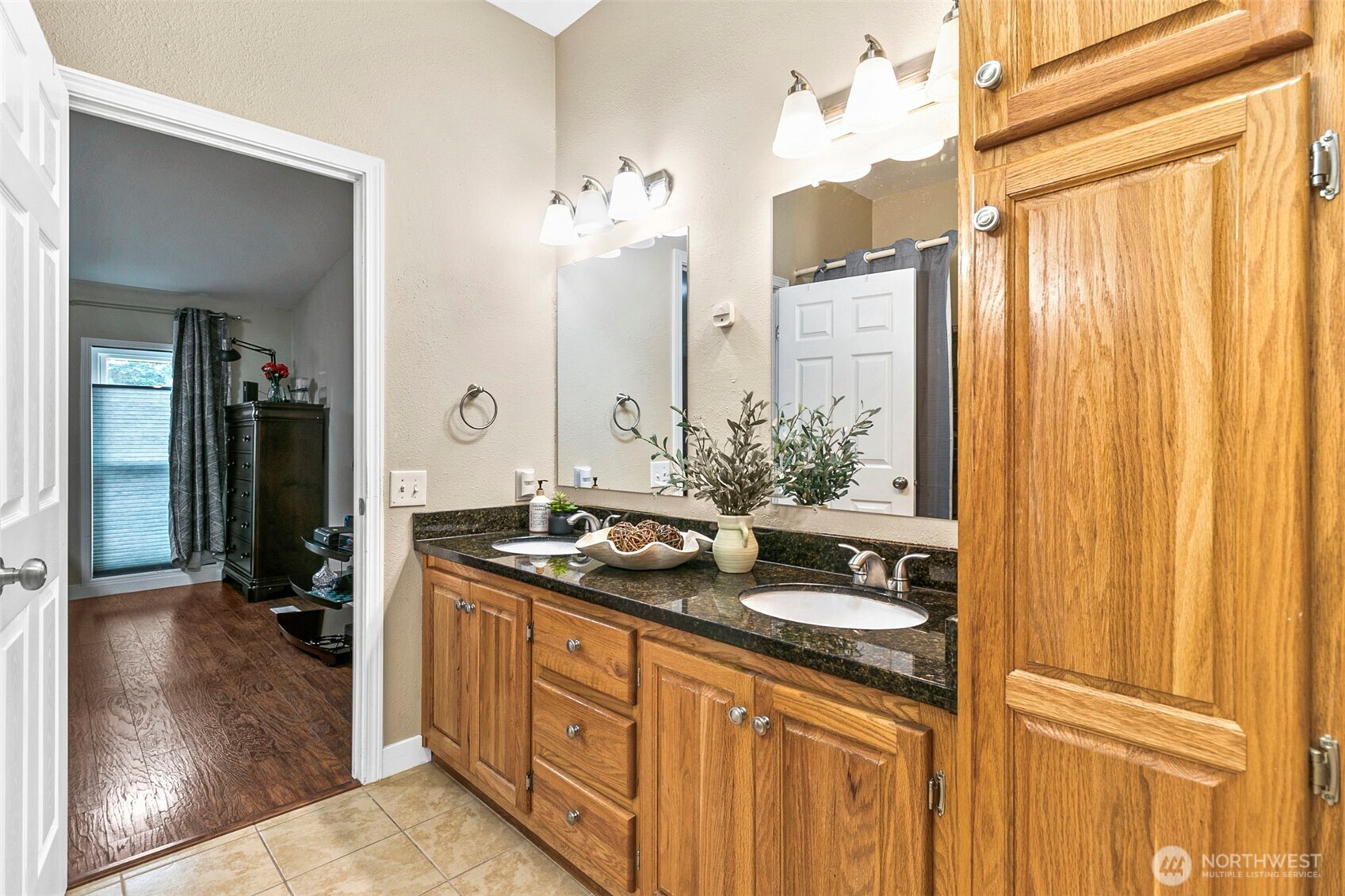 4416 South 315th Street Auburn, WA 98001 - Photo 33 of 37 a bathroom with a granite countertop sink and a mirror