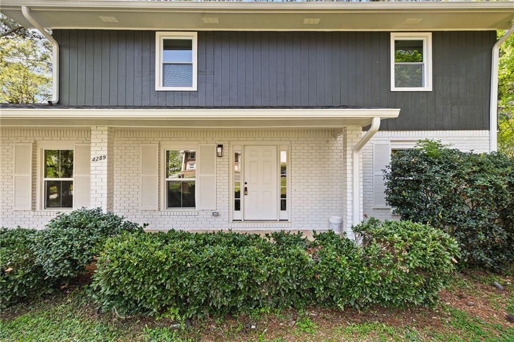 4289 Kimball Road Southwest Atlanta, GA 30331 - Photo 2 of 20 a front view of a house with garden