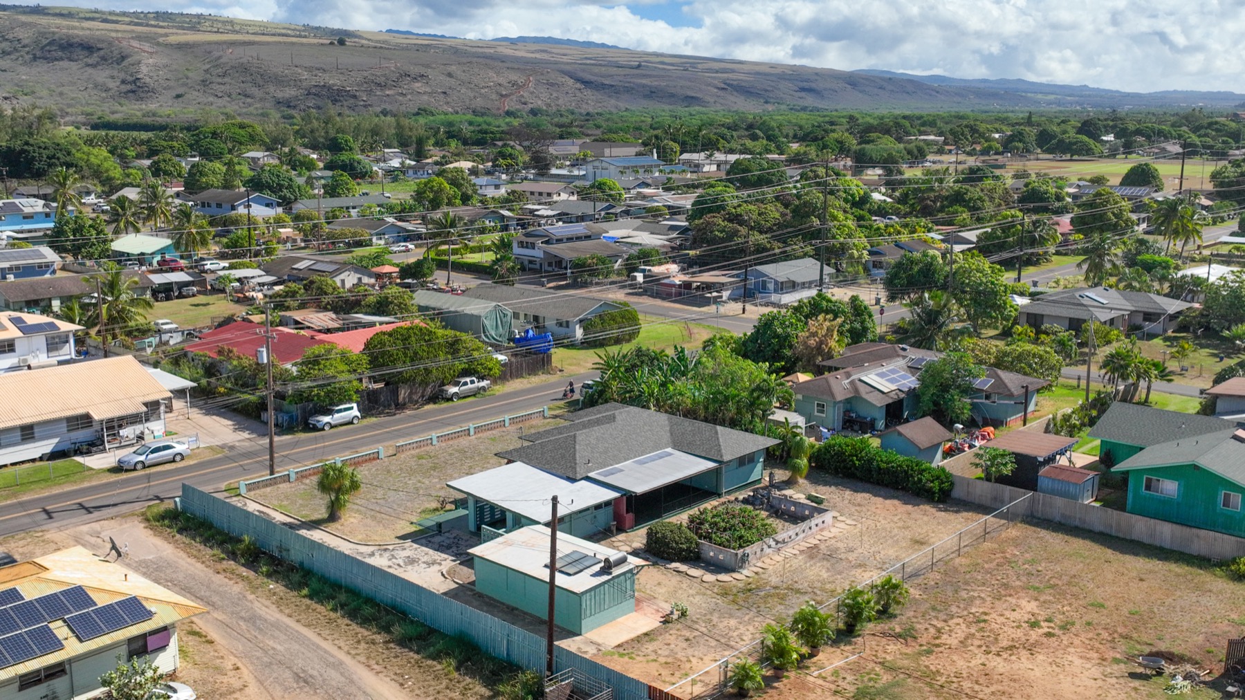 7976 Elepaio Road Kekaha, HI 96752 - Photo 17 of 30 an aerial view of a house with garden space and street view