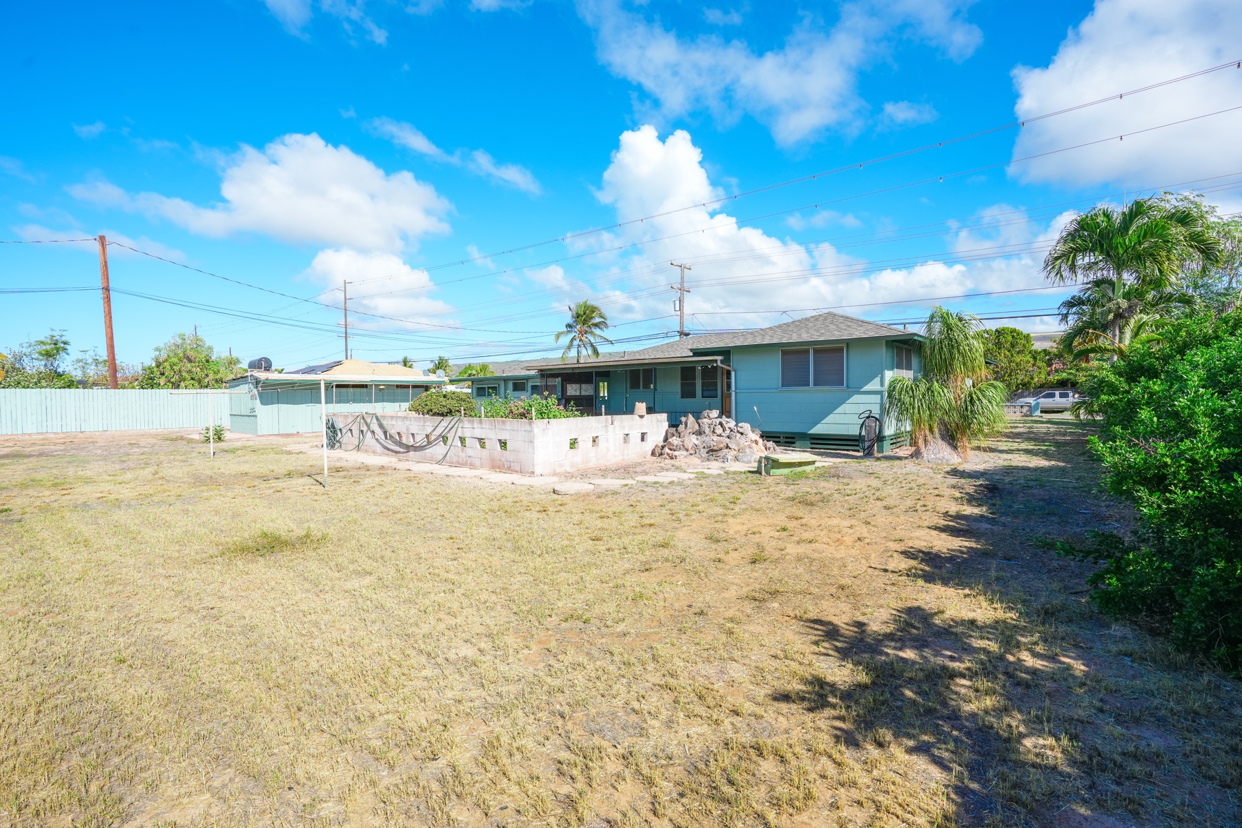 7976 Elepaio Road Kekaha, HI 96752 - Photo 23 of 30 a view of a terrace with a garden
