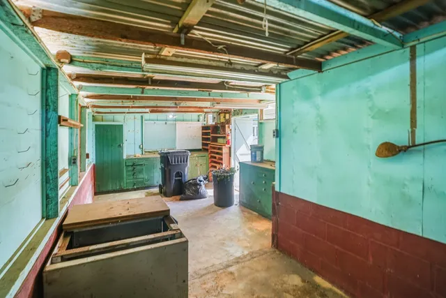 a room with walk in closet and window