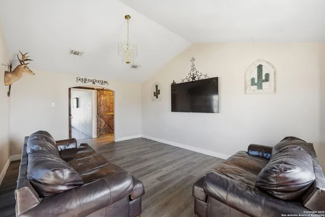 a large kitchen with kitchen island granite countertop a large counter top stainless steel appliances and cabinets