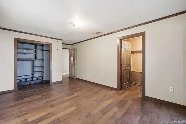 a bathroom with a shower and toilet