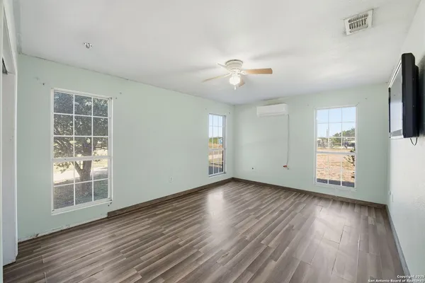 a bathroom with a bath tub and shower