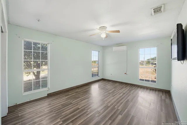a bathroom with a bath tub and shower