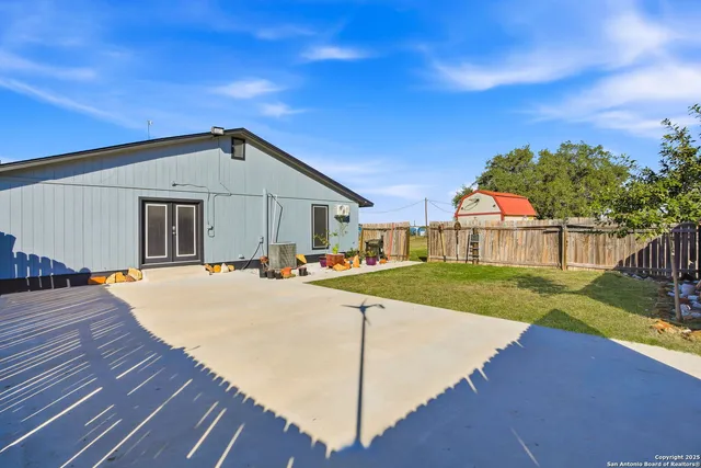 a view of path along with retail shop and outdoor seating