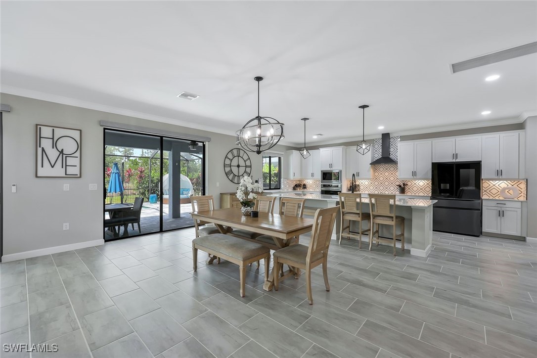 11697 Canopy Loop Fort Myers, FL 33913 - Photo 11 of 50 a view of a dining room with furniture window and outside view