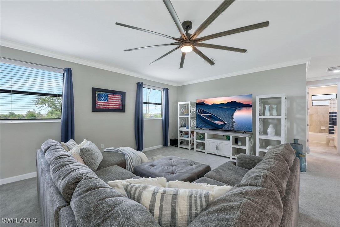 11697 Canopy Loop Fort Myers, FL 33913 - Photo 14 of 50 a living room with furniture and a flat screen tv