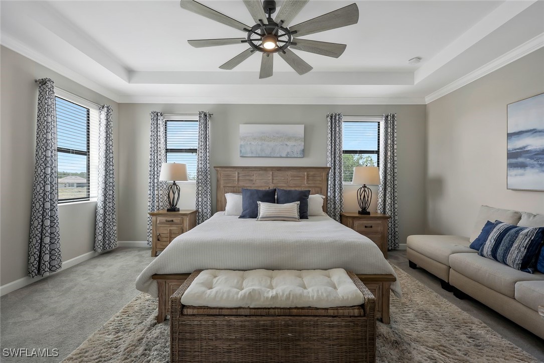 11697 Canopy Loop Fort Myers, FL 33913 - Photo 15 of 50 a bedroom with a bed couch and window