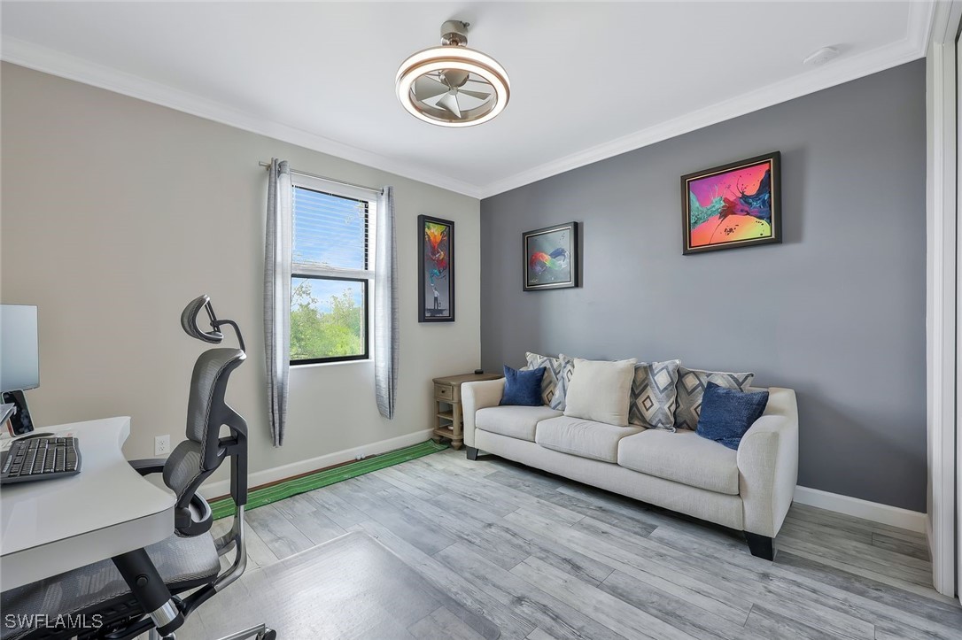 11697 Canopy Loop Fort Myers, FL 33913 - Photo 20 of 50 a living room with furniture a window and a flat screen tv