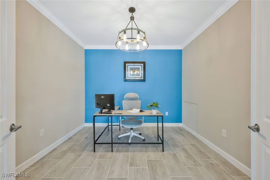 11697 Canopy Loop Fort Myers, FL 33913 - Photo 26 of 50 a workspace room with furniture and wooden floor