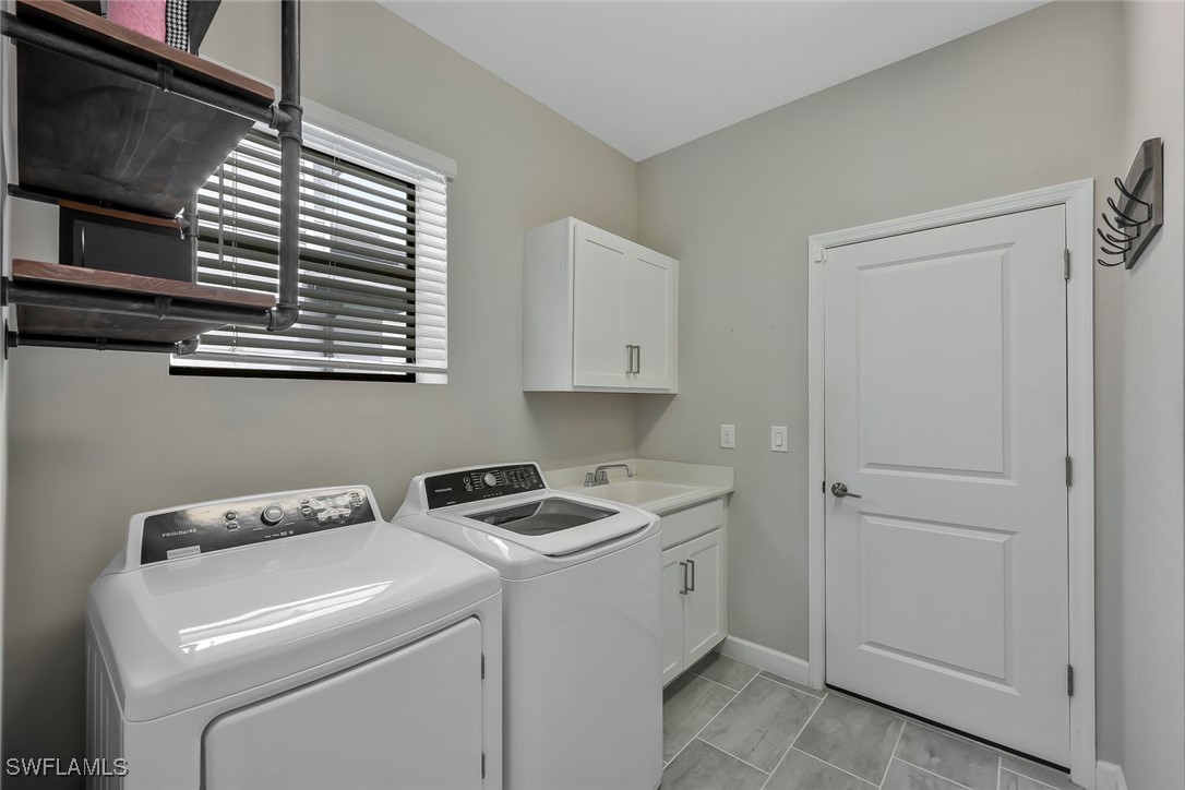 11697 Canopy Loop Fort Myers, FL 33913 - Photo 30 of 50 a utility room with dryer and washer