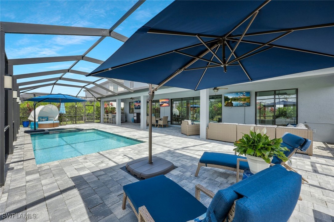 11697 Canopy Loop Fort Myers, FL 33913 - Photo 37 of 50 a view of a backyard with furniture and a patio