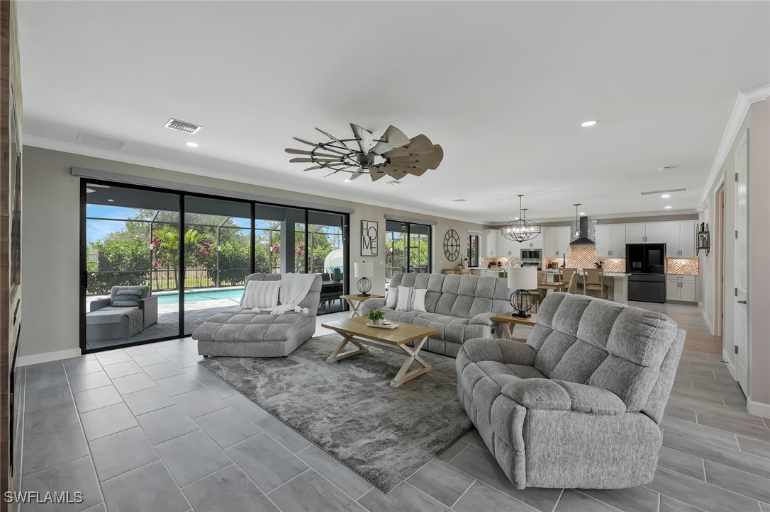 11697 Canopy Loop Fort Myers, FL 33913 - Photo 4 of 50 a living room with furniture and a large window