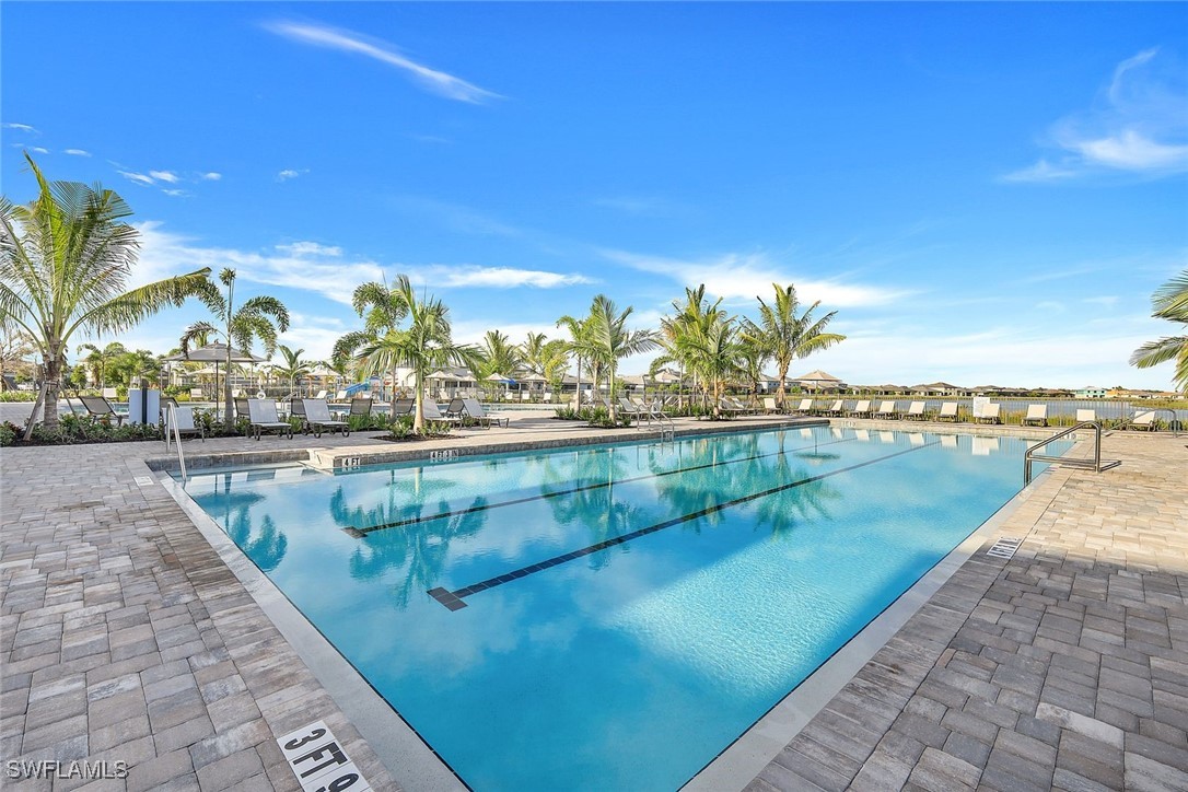 11697 Canopy Loop Fort Myers, FL 33913 - Photo 45 of 50 a view of swimming pool with outdoor seating and city view