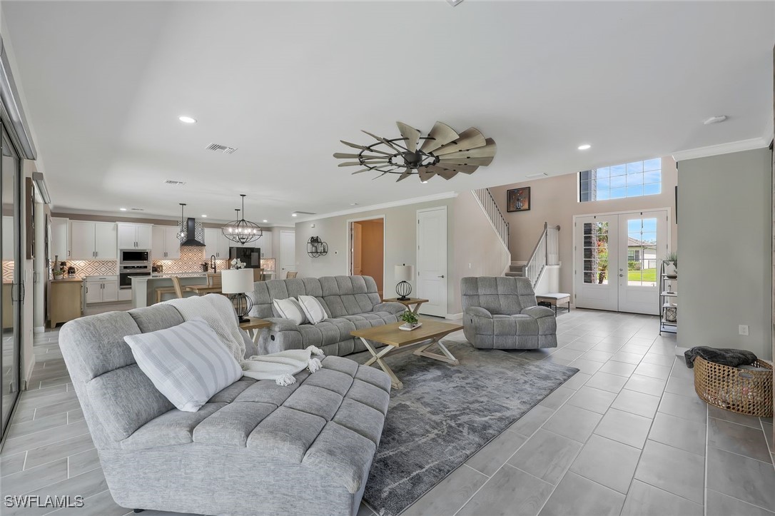 11697 Canopy Loop Fort Myers, FL 33913 - Photo 5 of 50 a living room with furniture and a large window