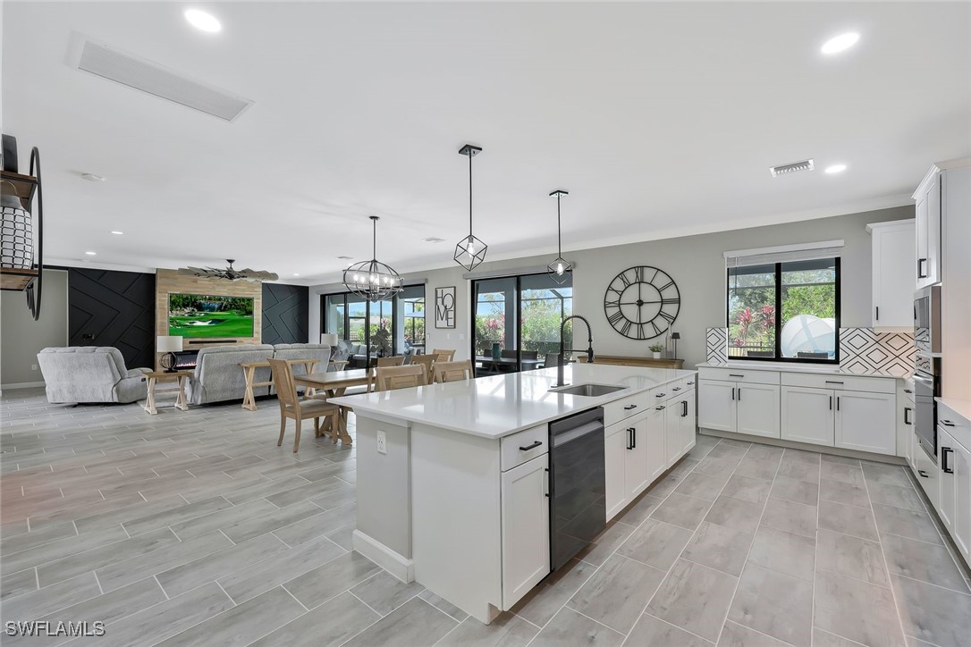 11697 Canopy Loop Fort Myers, FL 33913 - Photo 8 of 50 a large kitchen with stainless steel appliances lots of counter top space