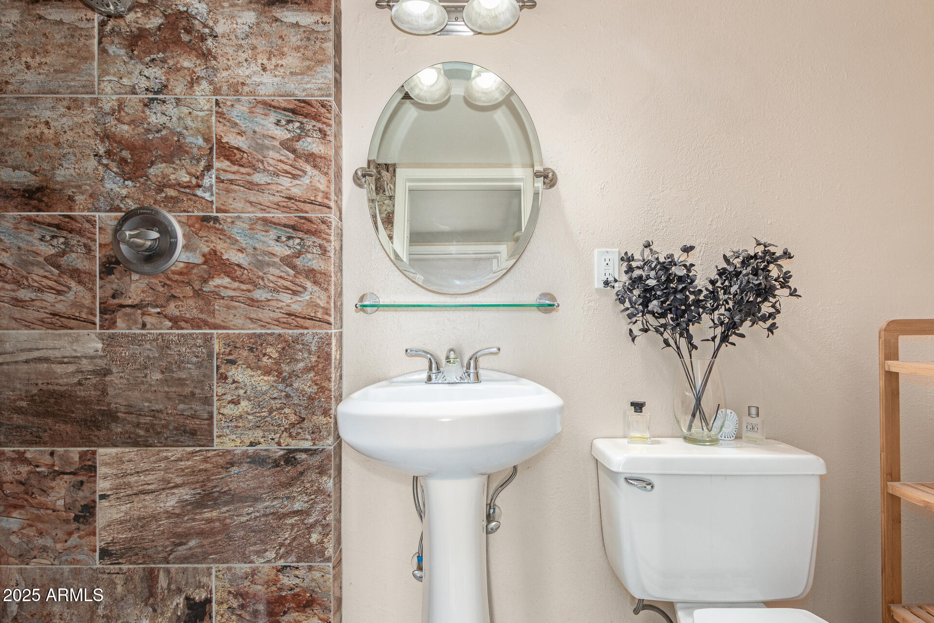 1320 East Bethany Home Road, Unit 54 Phoenix, AZ 85014 - Photo 19 of 37 a bathroom with a sink a mirror and vanity