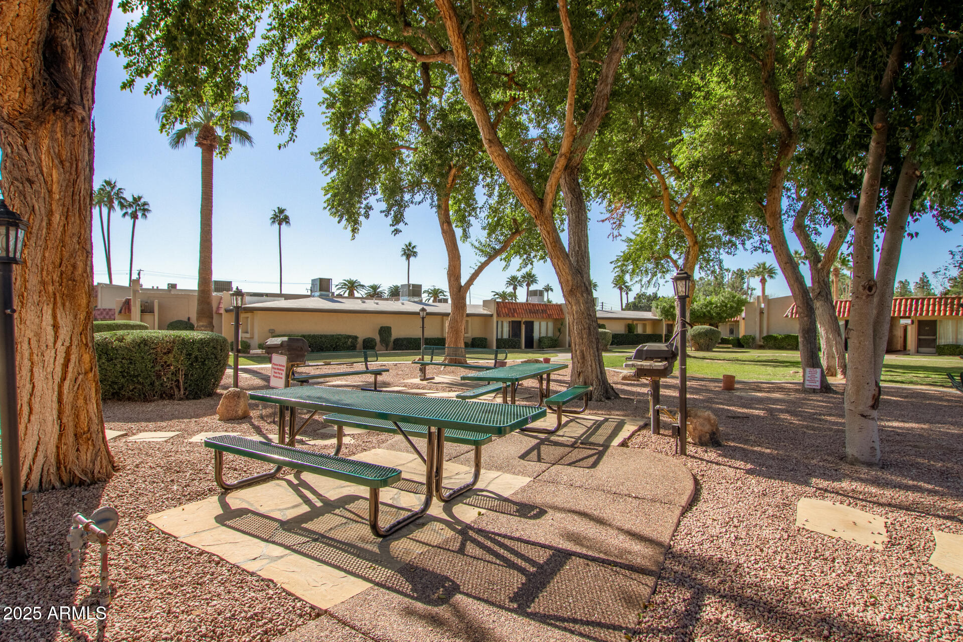 1320 East Bethany Home Road, Unit 54 Phoenix, AZ 85014 - Photo 26 of 37 a view of a backyard with sitting area