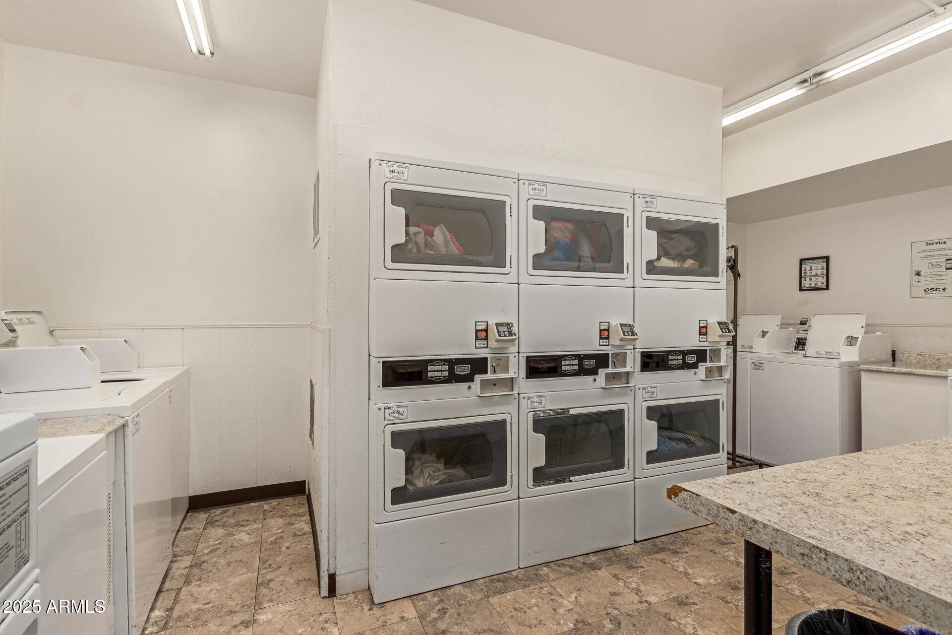 1320 East Bethany Home Road, Unit 54 Phoenix, AZ 85014 - Photo 30 of 37 a kitchen with a stove and a refrigerator