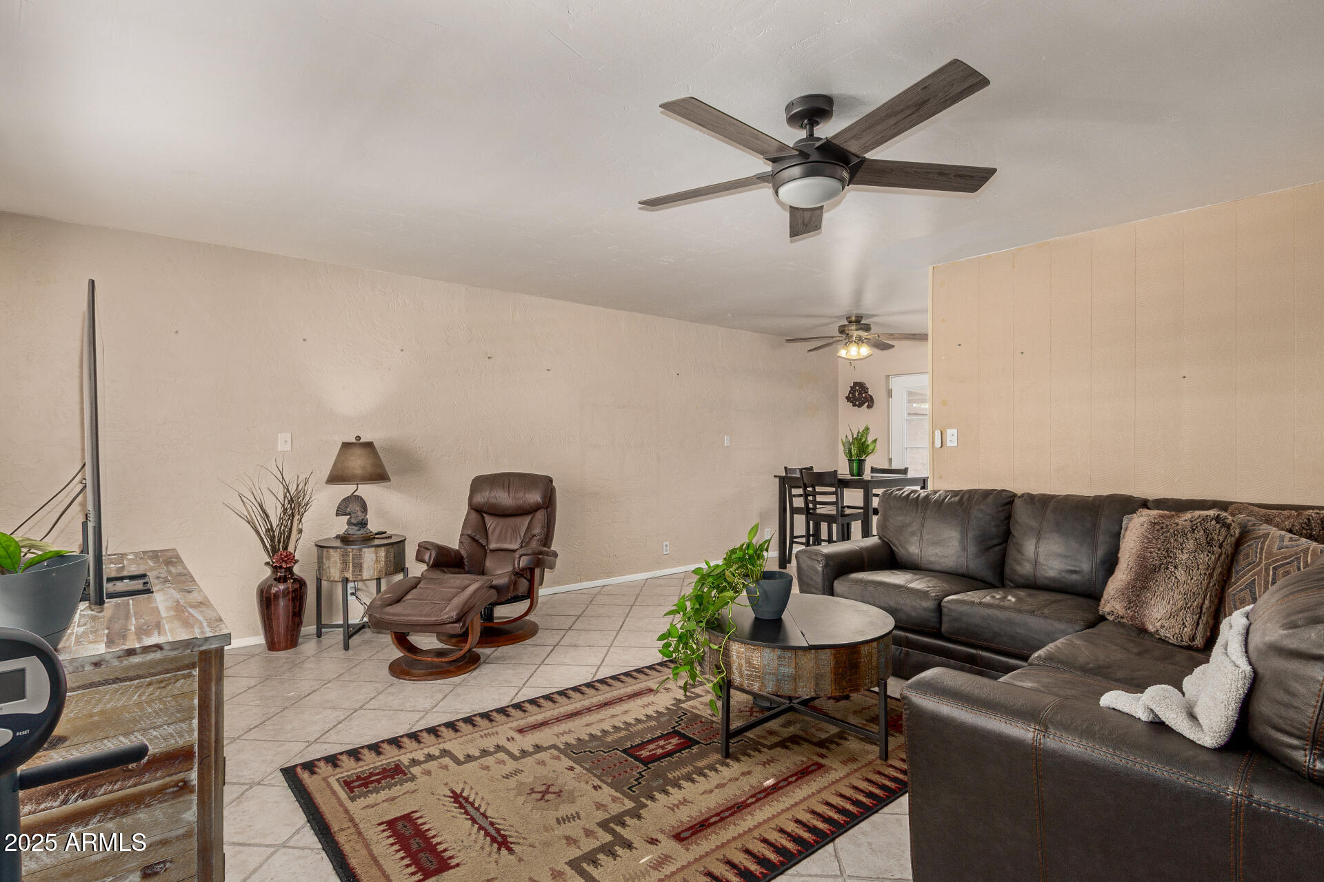 1320 East Bethany Home Road, Unit 54 Phoenix, AZ 85014 - Photo 5 of 37 a living room with furniture
