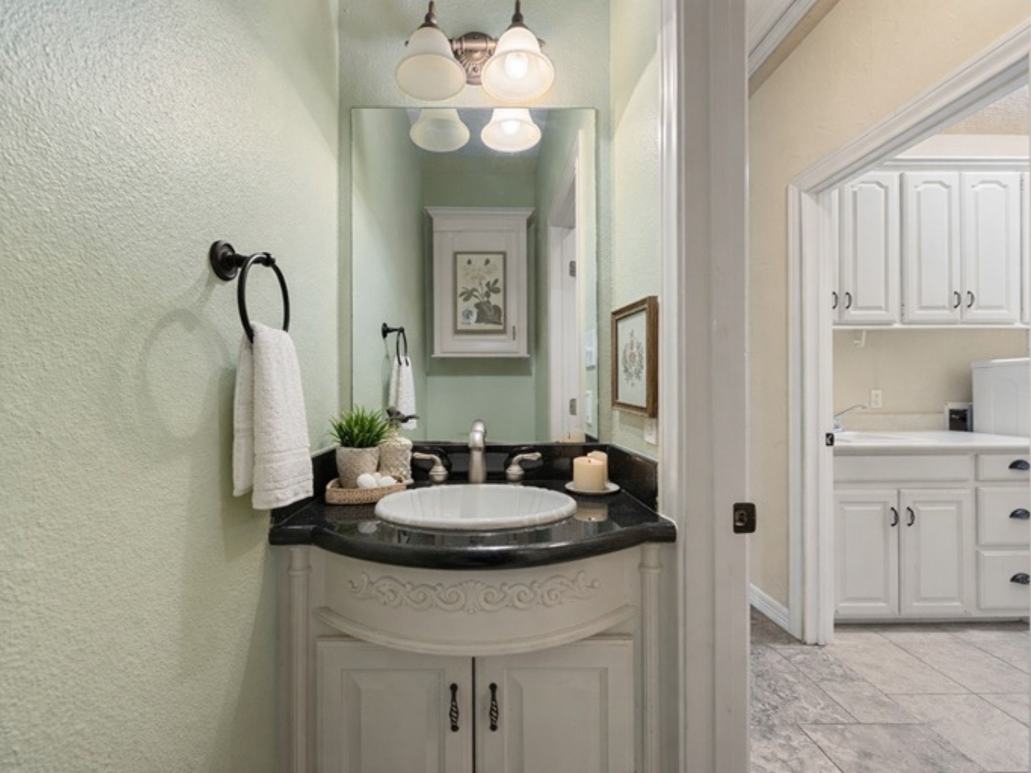 28618 Benders Crossing Drive Spring, TX 77386 - Photo 18 of 46 Conveniently located between the formal living and family room is the powder room for guests.