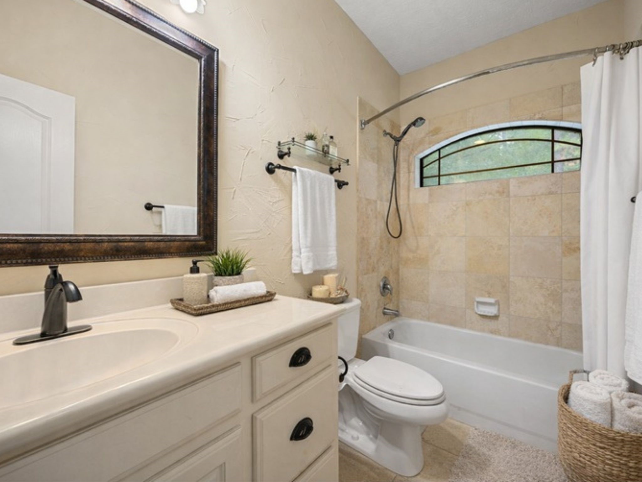 28618 Benders Crossing Drive Spring, TX 77386 - Photo 32 of 46 Located between the two secondary bedrooms is this full bath with counter space, tub shower combo and window.